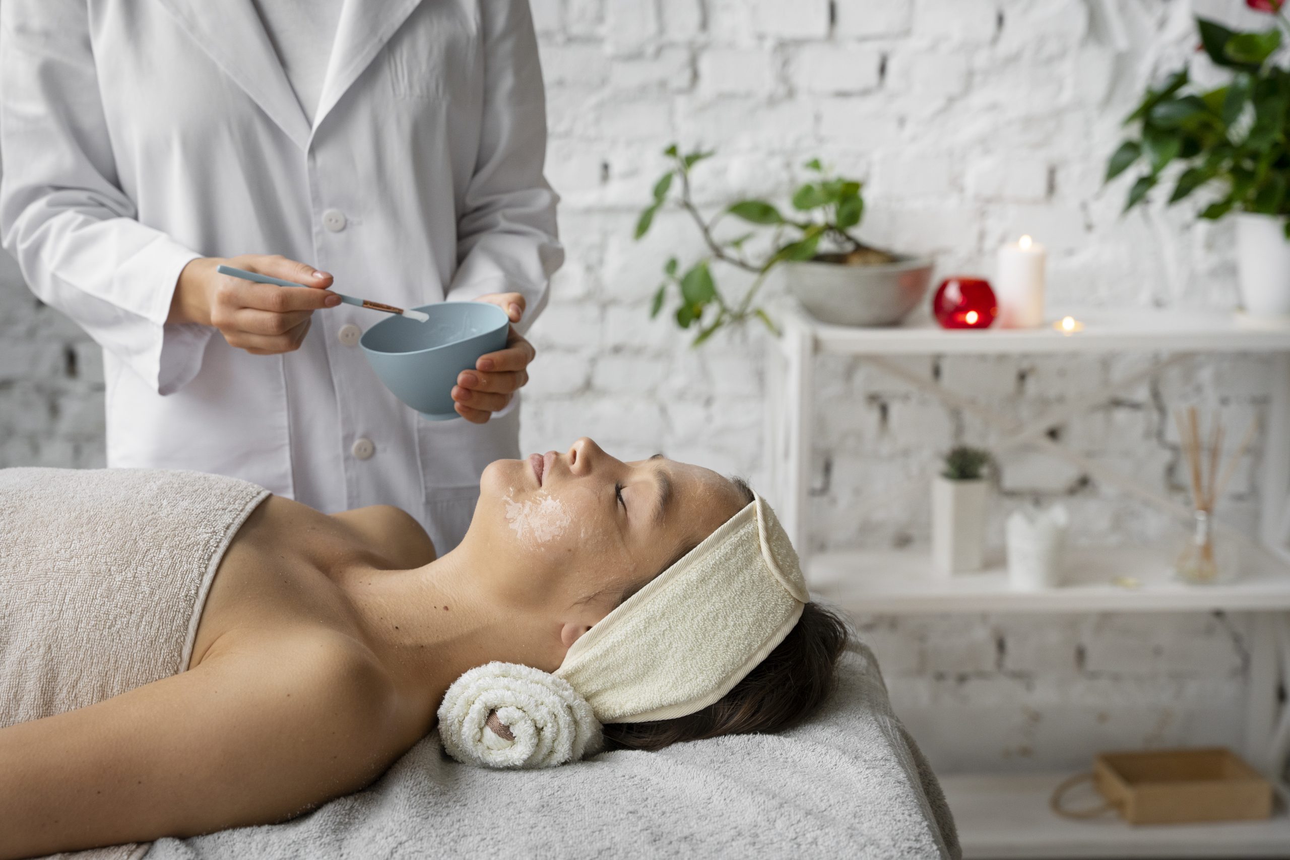 side view woman getting massaged spa (1)